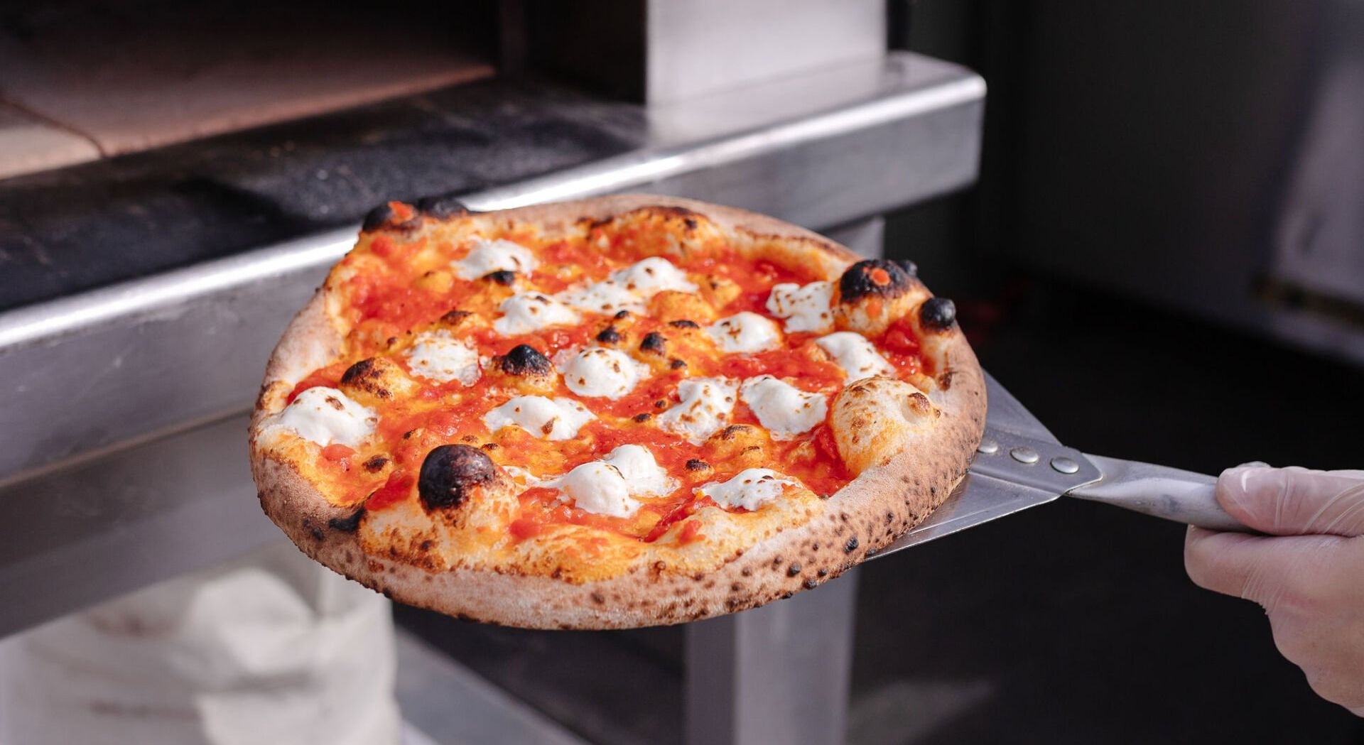 About Us - Pizza on peel