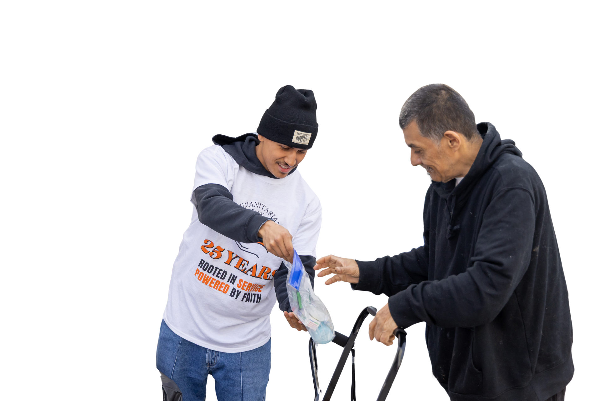 Two men are standing next to each other on a white background . one of the men is wearing a 24 year t-shirt.