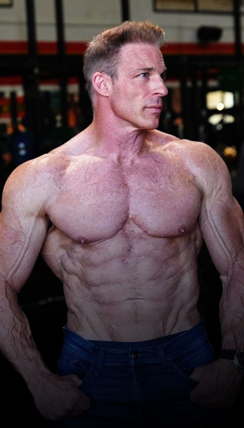 Ron Matthews is standing in a gym