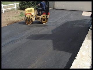 Pavement Paver in a Road Construction Site — Kent, WA — Acme Paving & Seal Coating, Inc.