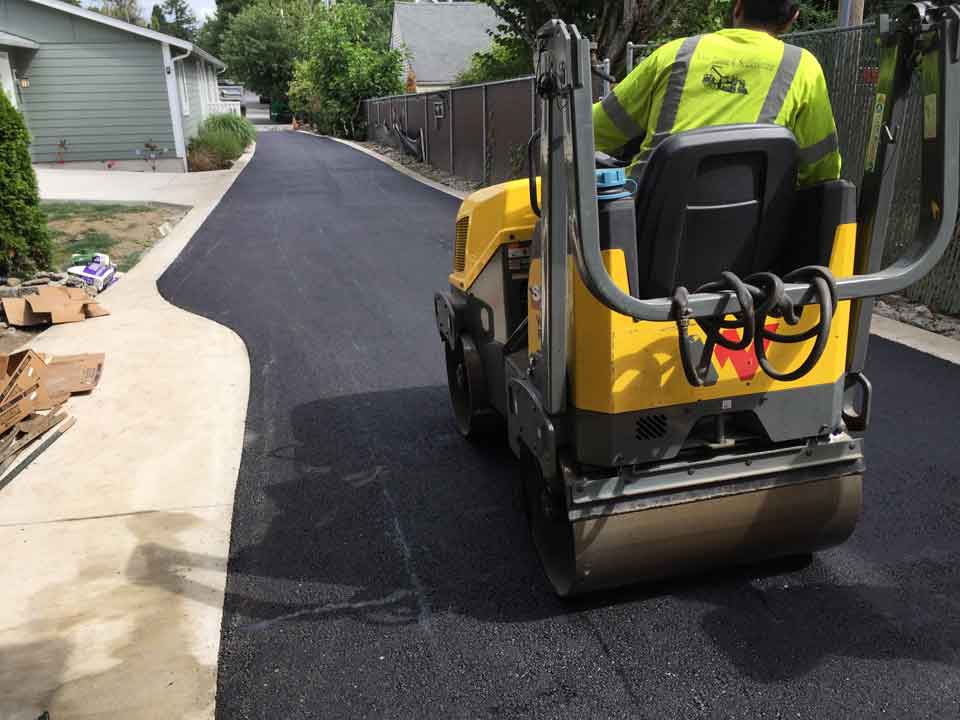 Man On Road Roller – Acme Paving & Seal Coating, Inc. – Kent, WA