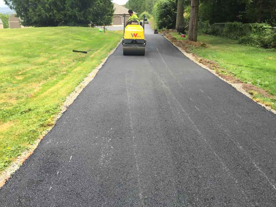 Man Operating Road Roller – Acme Paving & Seal Coating, Inc. – Kent, WA