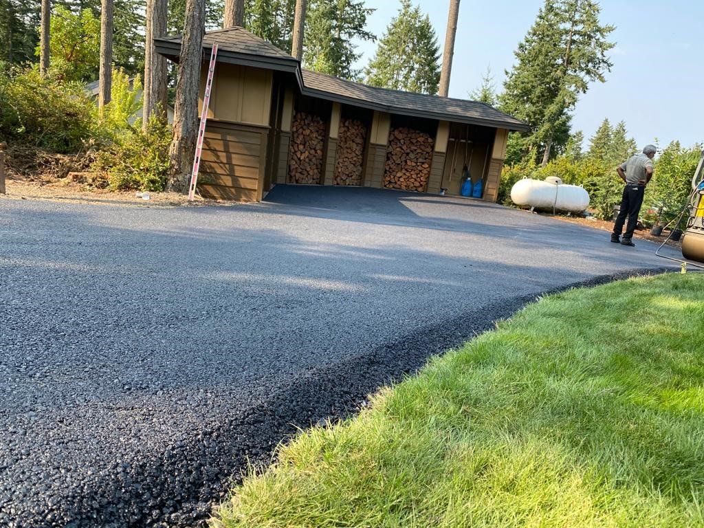 A home with new asphalt paving in Seattle, WA