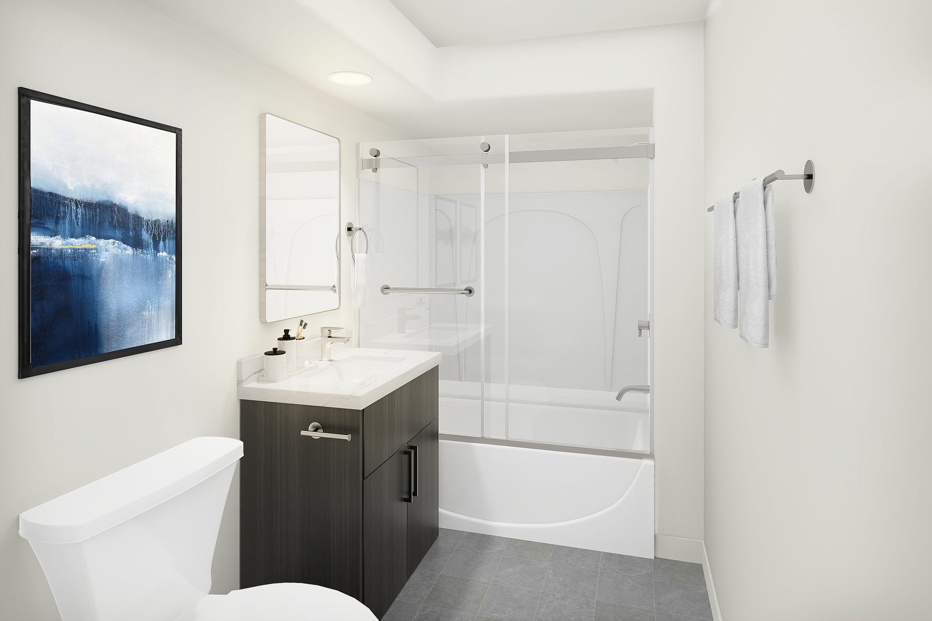 A bathroom with a toilet , sink , and bathtub.