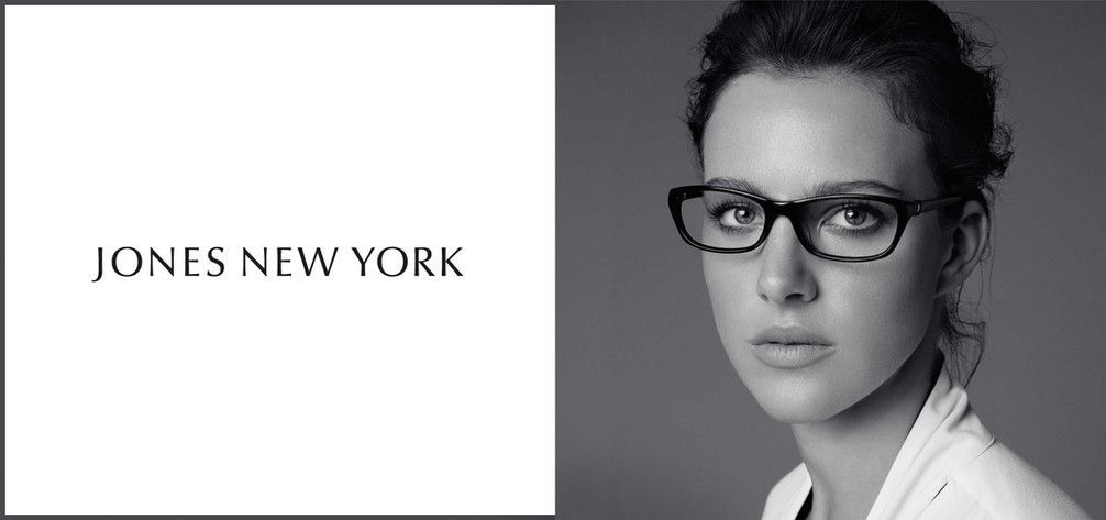 A black and white photo of a woman wearing glasses by jones new york