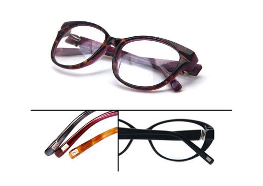 A pair of glasses sitting on top of a white surface