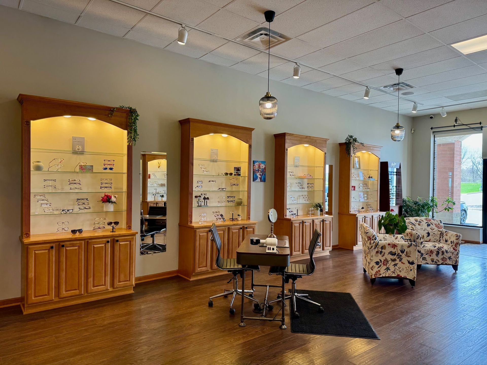A large room with a table and chairs in it