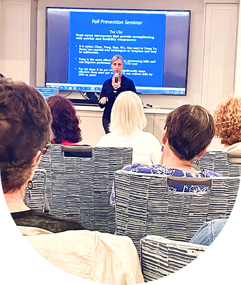 A man is giving a presentation to a group of people.