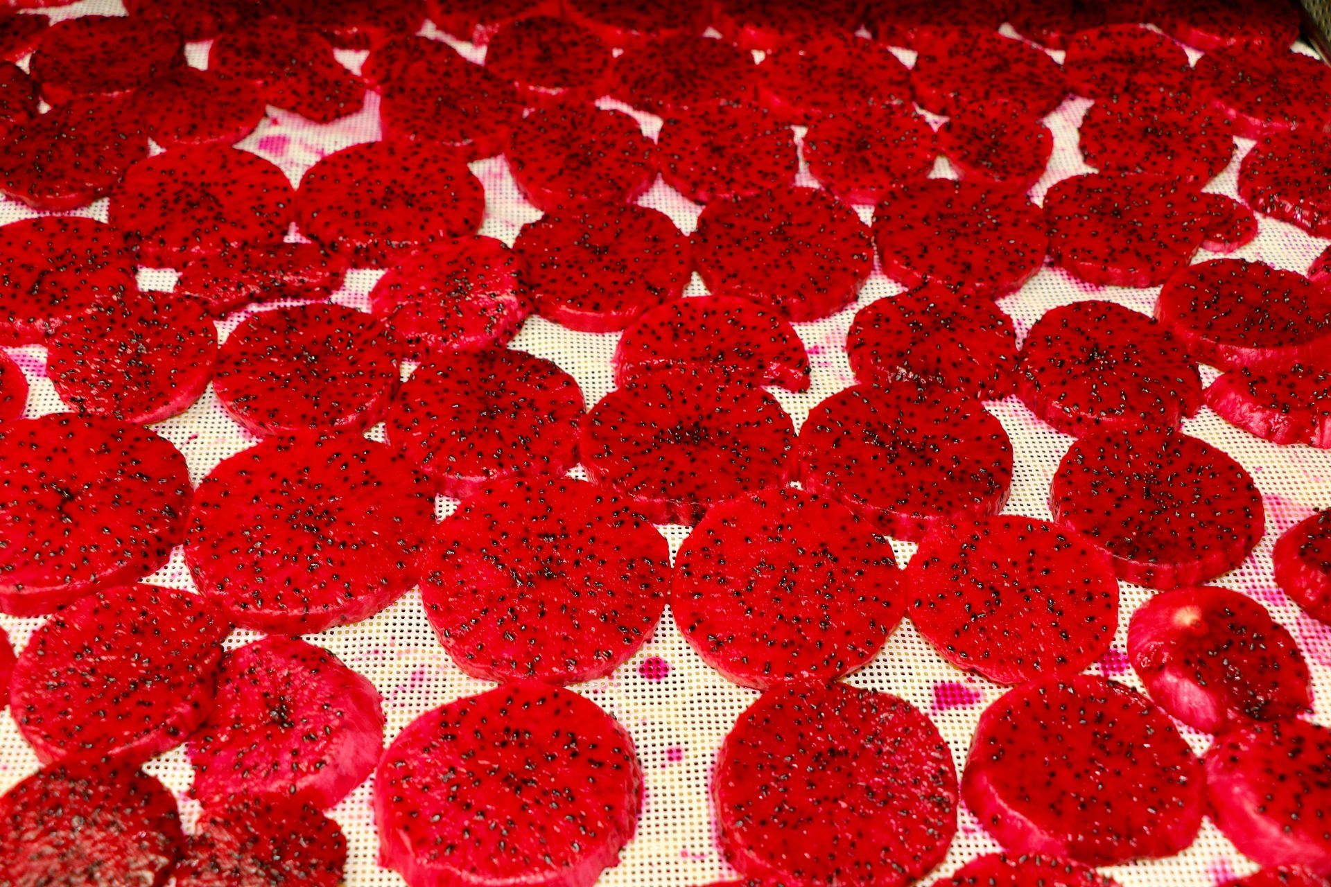 A Mango Slices Next to a Bag of Dried Mango Slices — Mareeba Golden Dried Mangoes in Mareeba, QLD