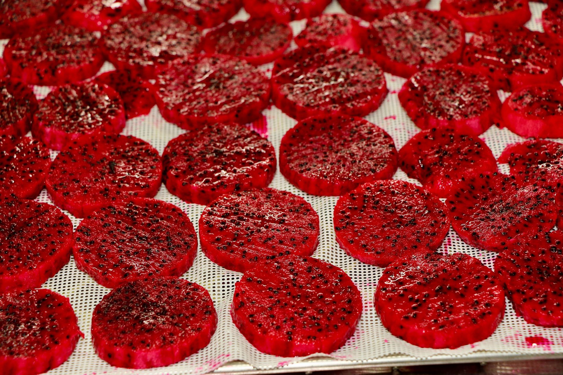 A Bunch of Red Circles Sitting on Top of Each Other on a Table — Mareeba Golden Dried Mangoes in Mareeba, QLD