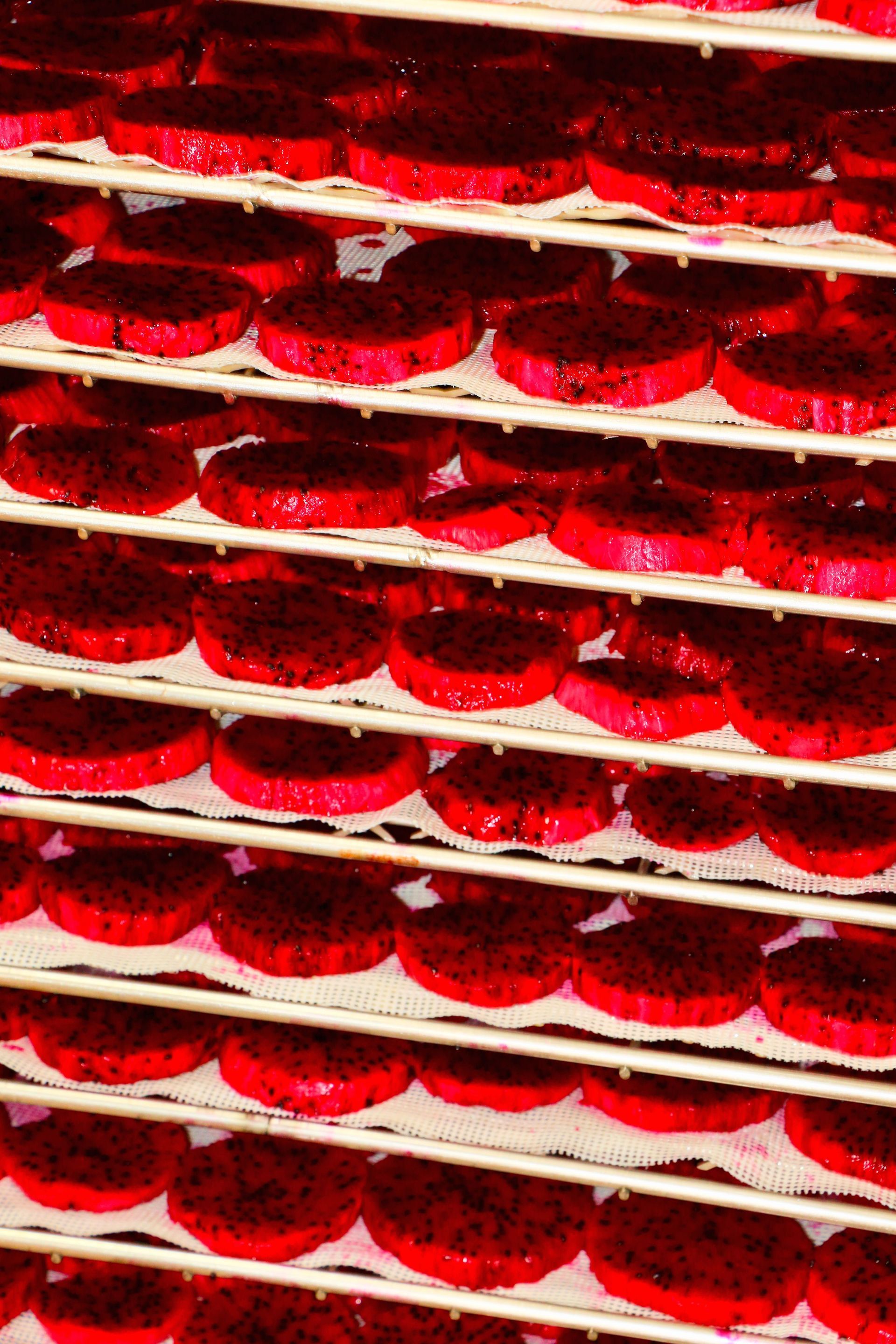 A Bunch of Red Cupcakes Are Sitting on a Shelf in a Refrigerator — Mareeba Golden Dried Mangoes in Mareeba, QLD