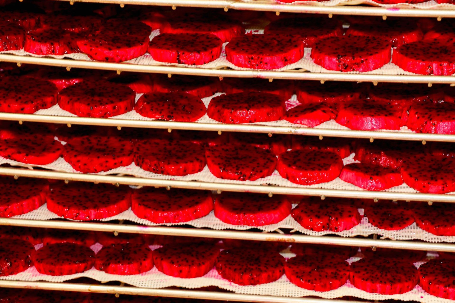 A Bunch of Red Cookies Are Sitting on a Shelf — Mareeba Golden Dried Mangoes in Mareeba, QLD