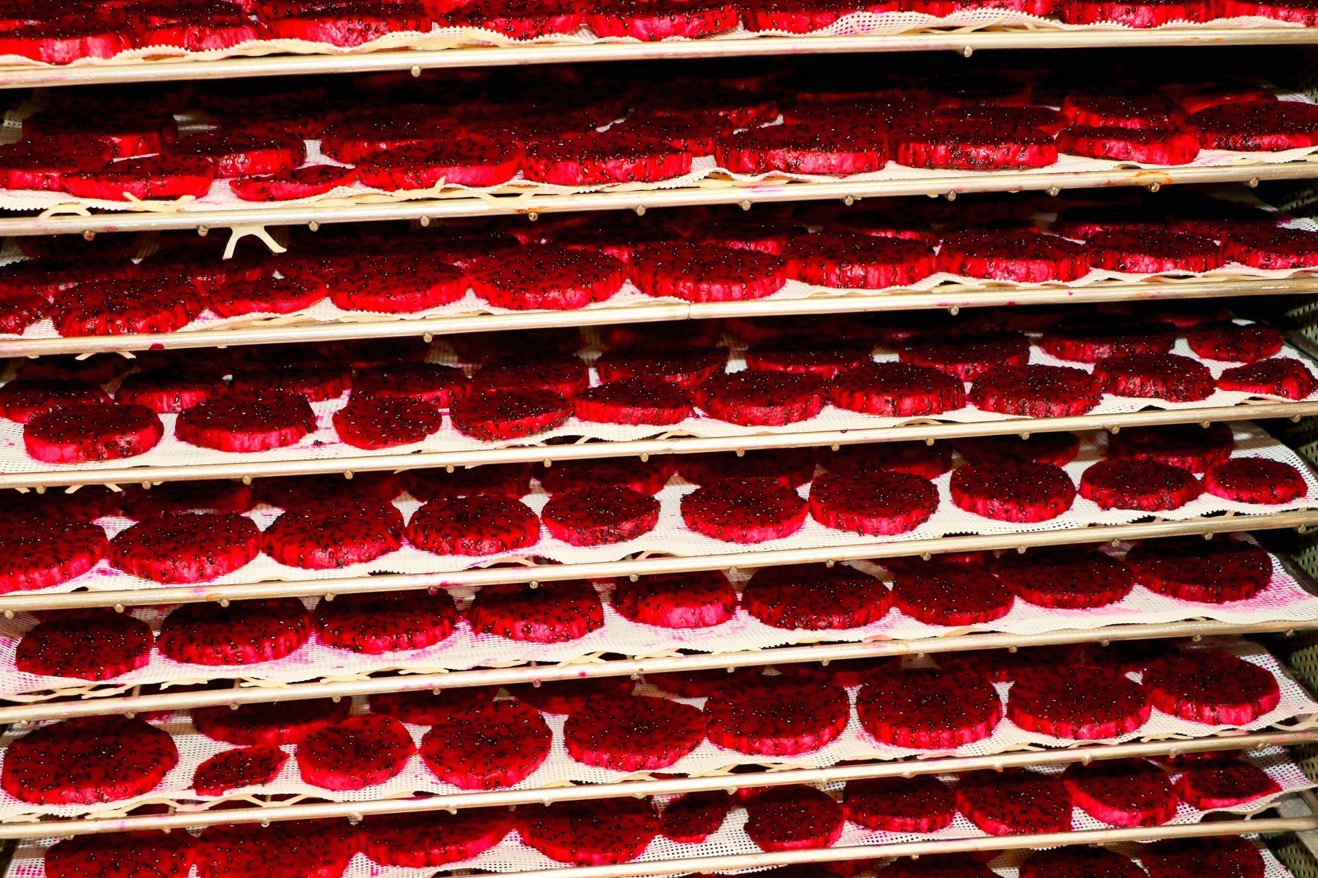 A Bunch of Red Circles Are Sitting on a Shelf — Mareeba Golden Dried Mangoes in Mareeba, QLD