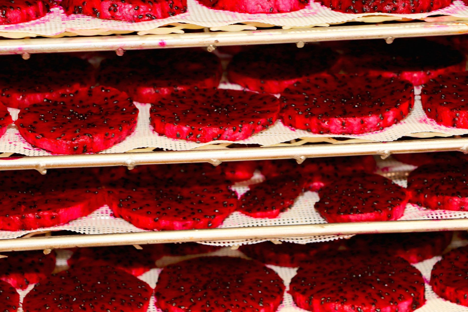 A Bunch of Red Cookies Are Sitting on a Shelf — Mareeba Golden Dried Mangoes in Mareeba, QLD