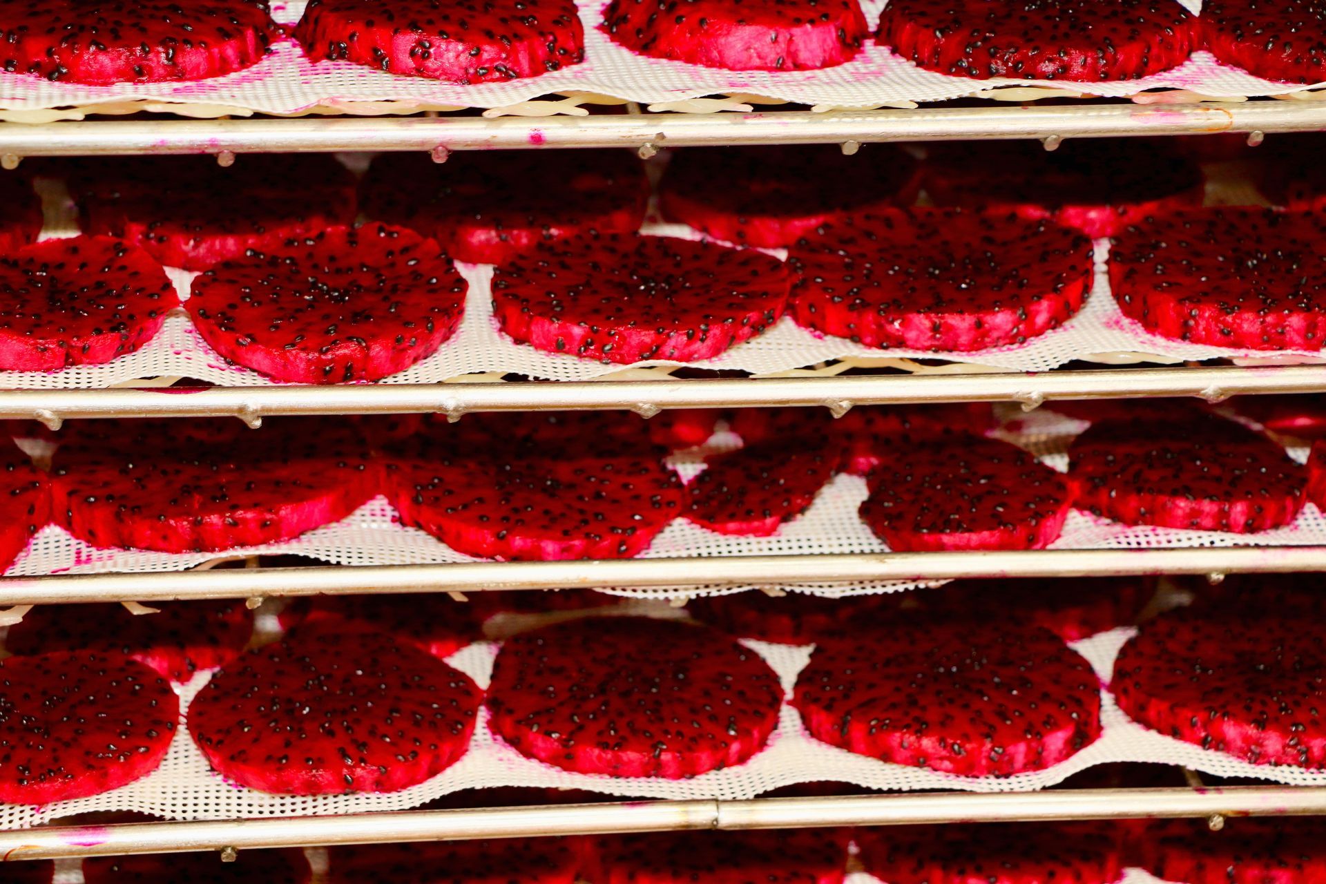 A Bunch of Red Cookies Are Sitting on a Shelf — Mareeba Golden Dried Mangoes in Mareeba, QLD