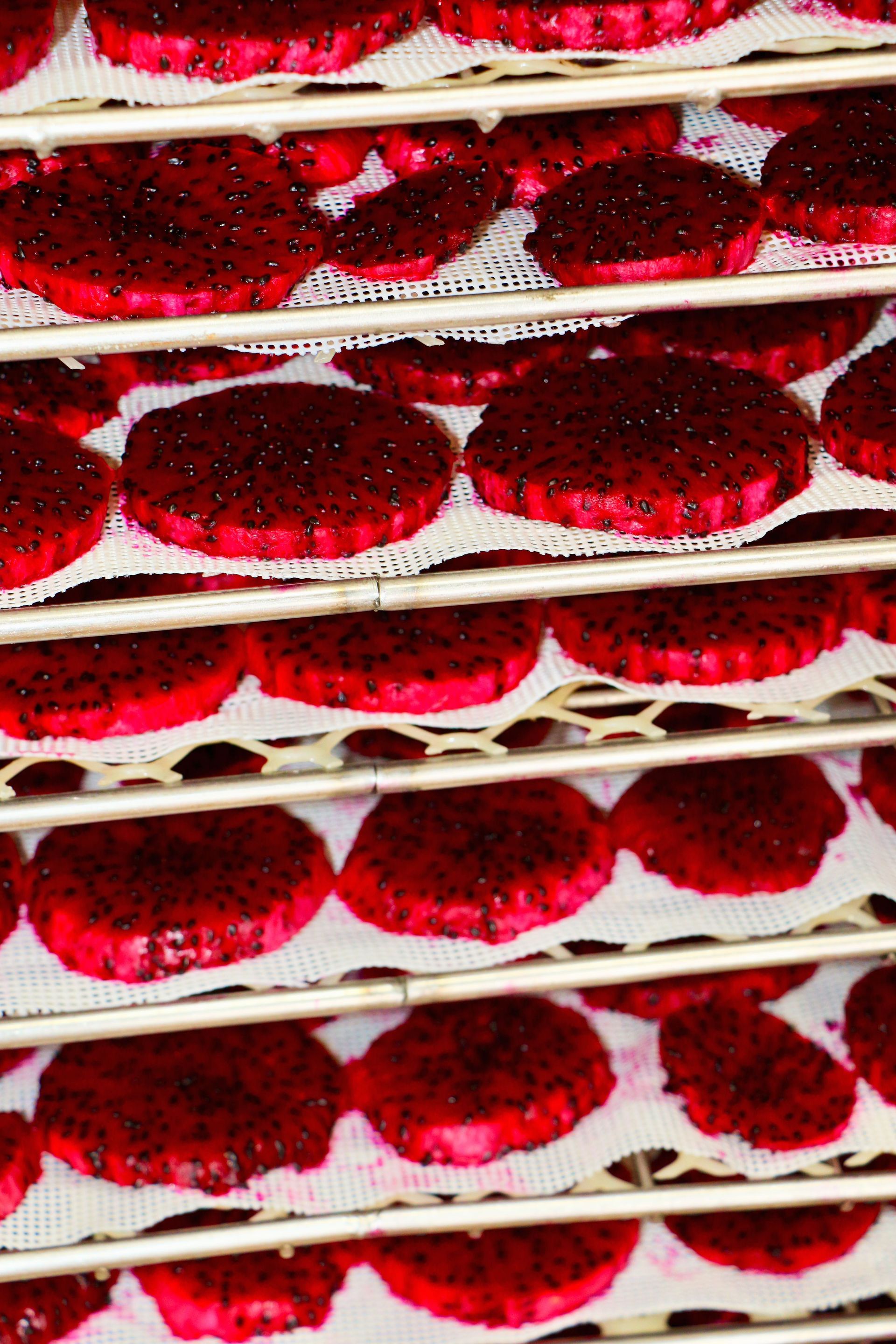 A Bunch of Red Cookies Are Sitting on a Shelf — Mareeba Golden Dried Mangoes in Mareeba, QLD