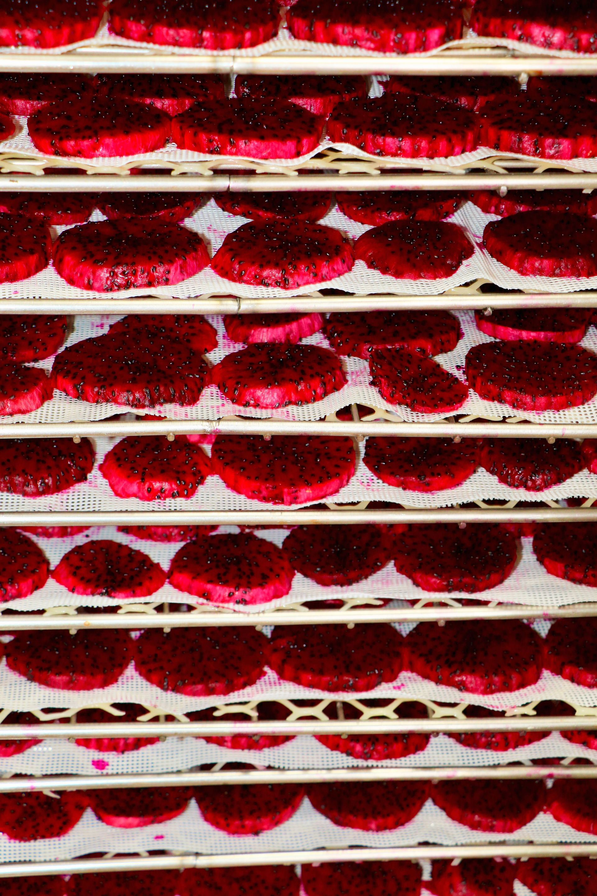 A Bunch of Red Cookies Are Sitting on a Shelf — Mareeba Golden Dried Mangoes in Mareeba, QLD