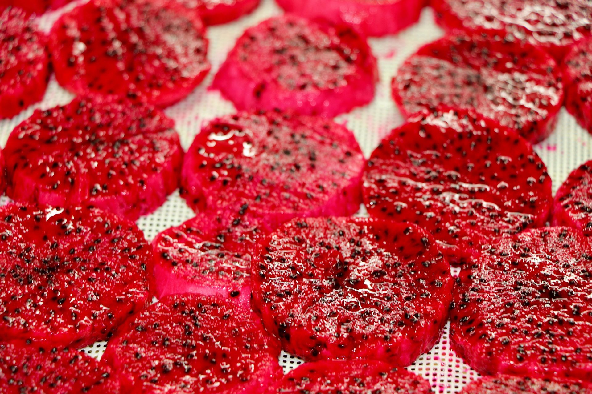 A Bunch of Red Circles Are Laying on a Table — Mareeba Golden Dried Mangoes in Mareeba, QLD