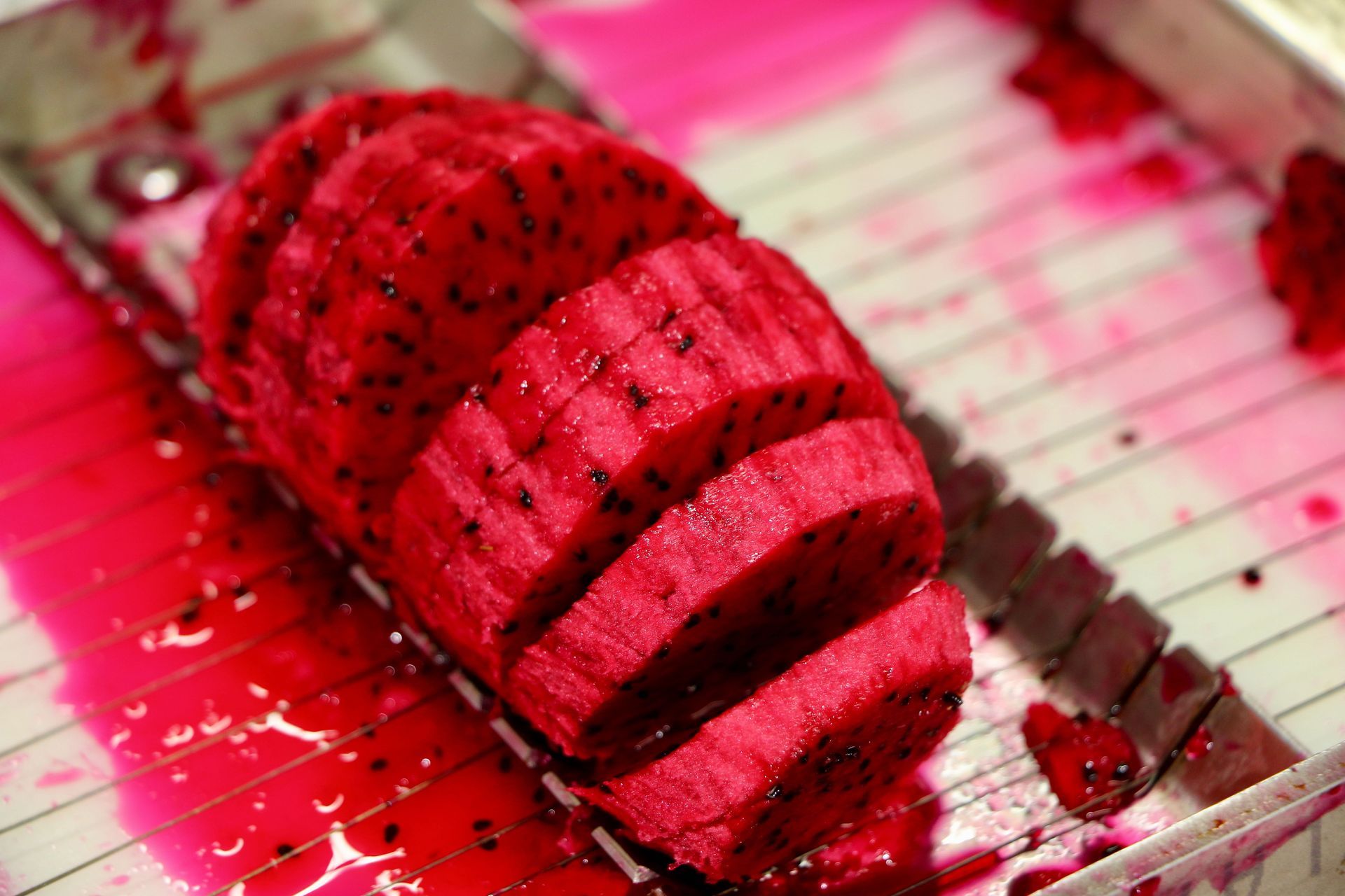 A Close Up of a Sliced Dragon Fruit on a Cutting Board — Mareeba Golden Dried Mangoes in Mareeba, QLD