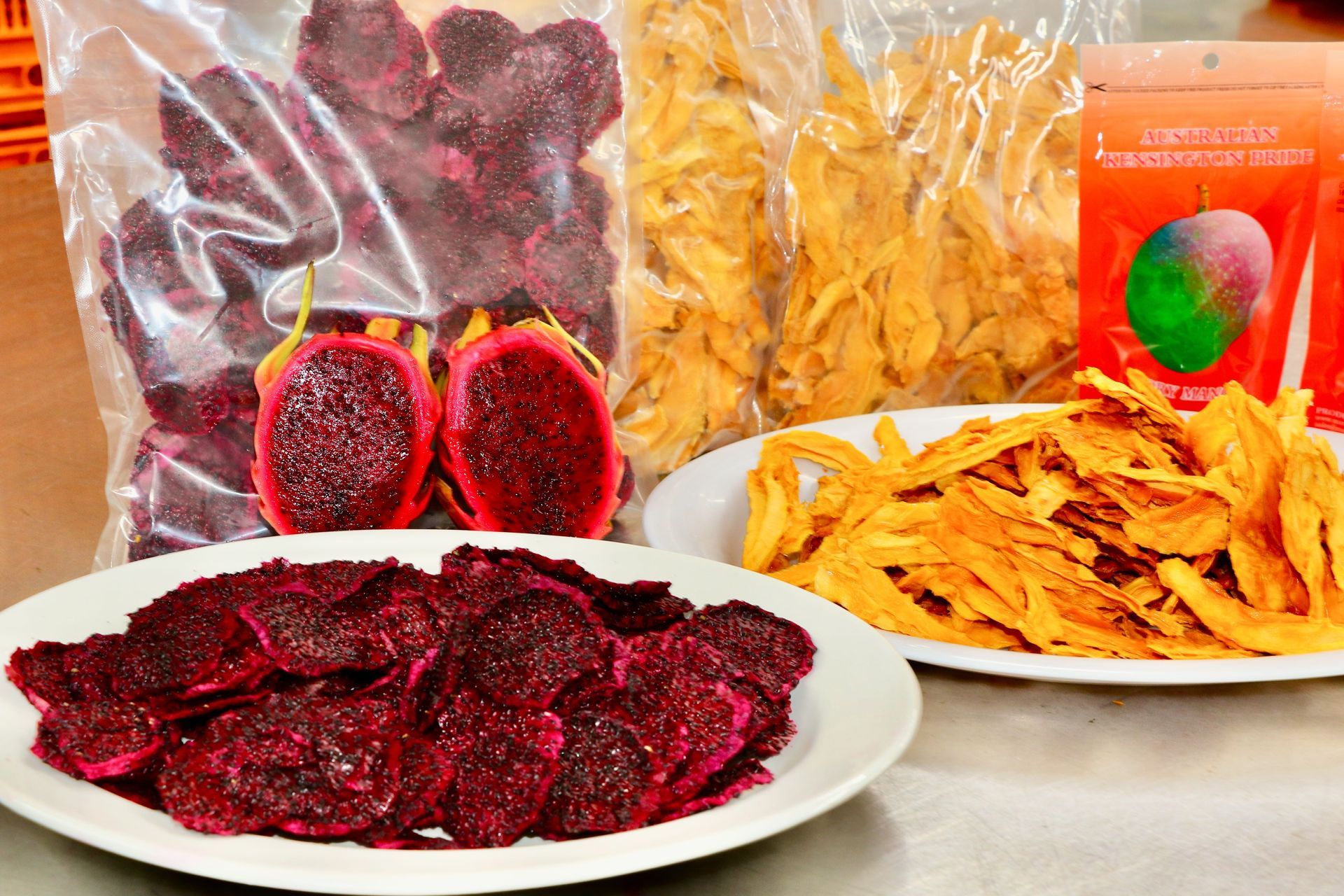A Bag of Dried Fruit Next to a Plate of Dried Fruit — Mareeba Golden Dried Mangoes in Mareeba, QLD