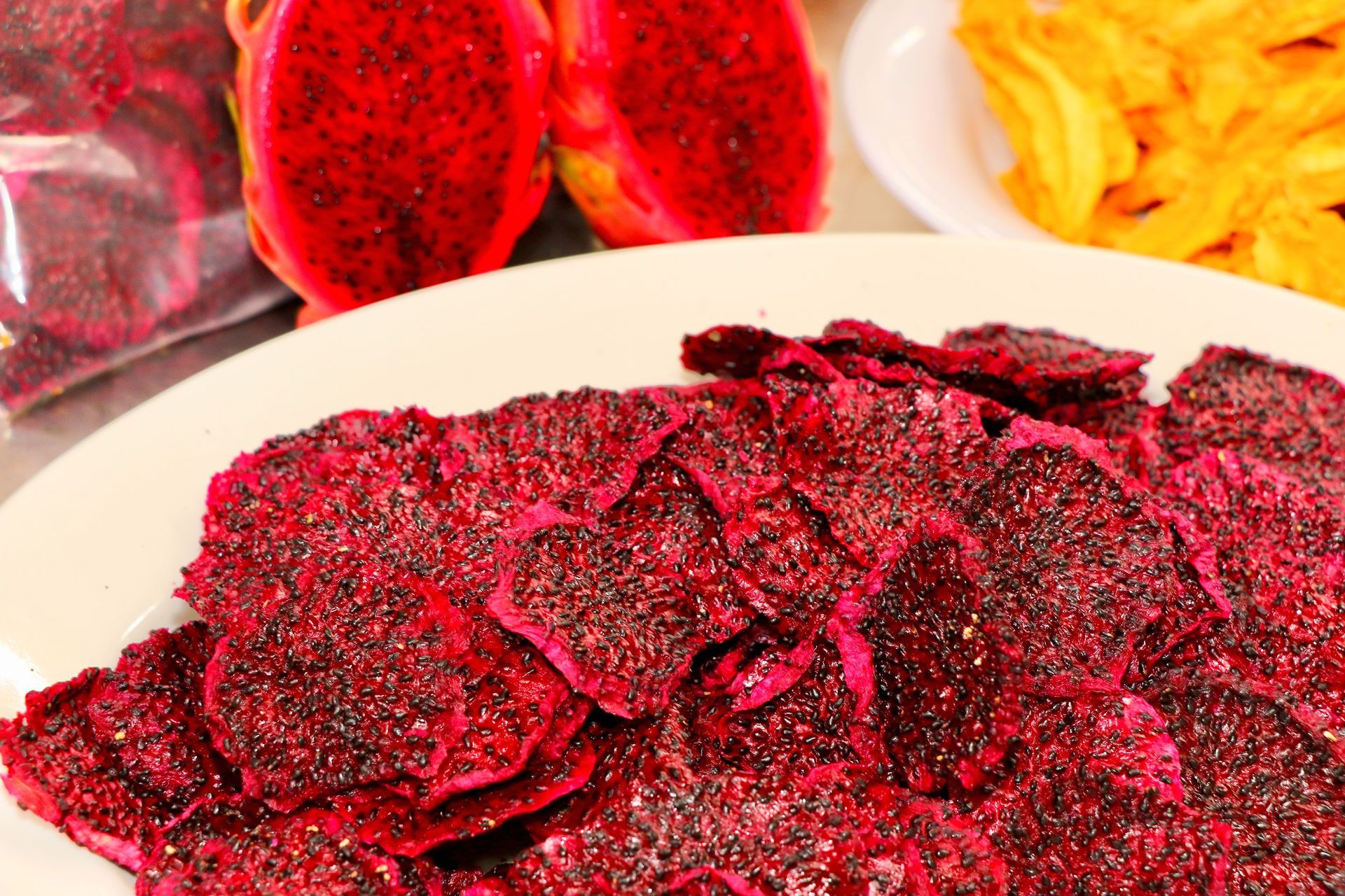 A Dragon Fruit Cut in Half Is  on A Plate Dried Out — Mareeba Golden Dried Mangoes in Mareeba, QLD