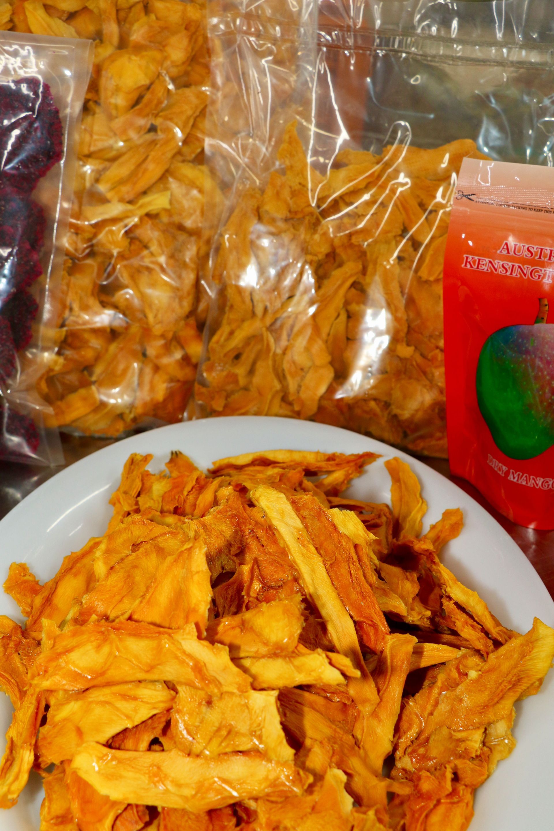 A Pile of Dragon Fruits With a Red One in the Middle — Mareeba Golden Dried Mangoes in Mareeba, QLD