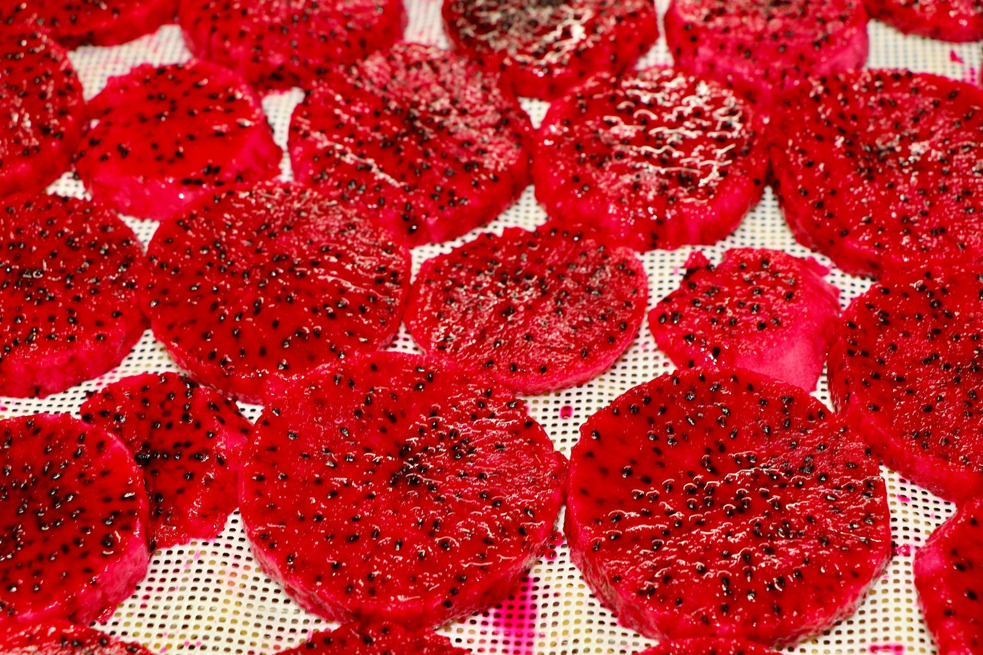 A Bunch of Dragon Fruits Are Sitting on a Cutting Board — Mareeba Golden Dried Mangoes in Mareeba, QLD