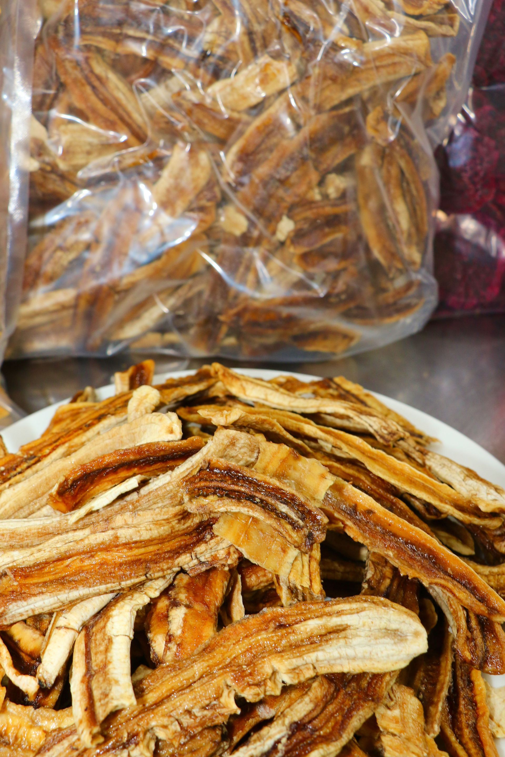 A Bunch of Red Slices of Dragon Fruit Are Sitting on a Table — Mareeba Golden Dried Mangoes in Mareeba, QLD