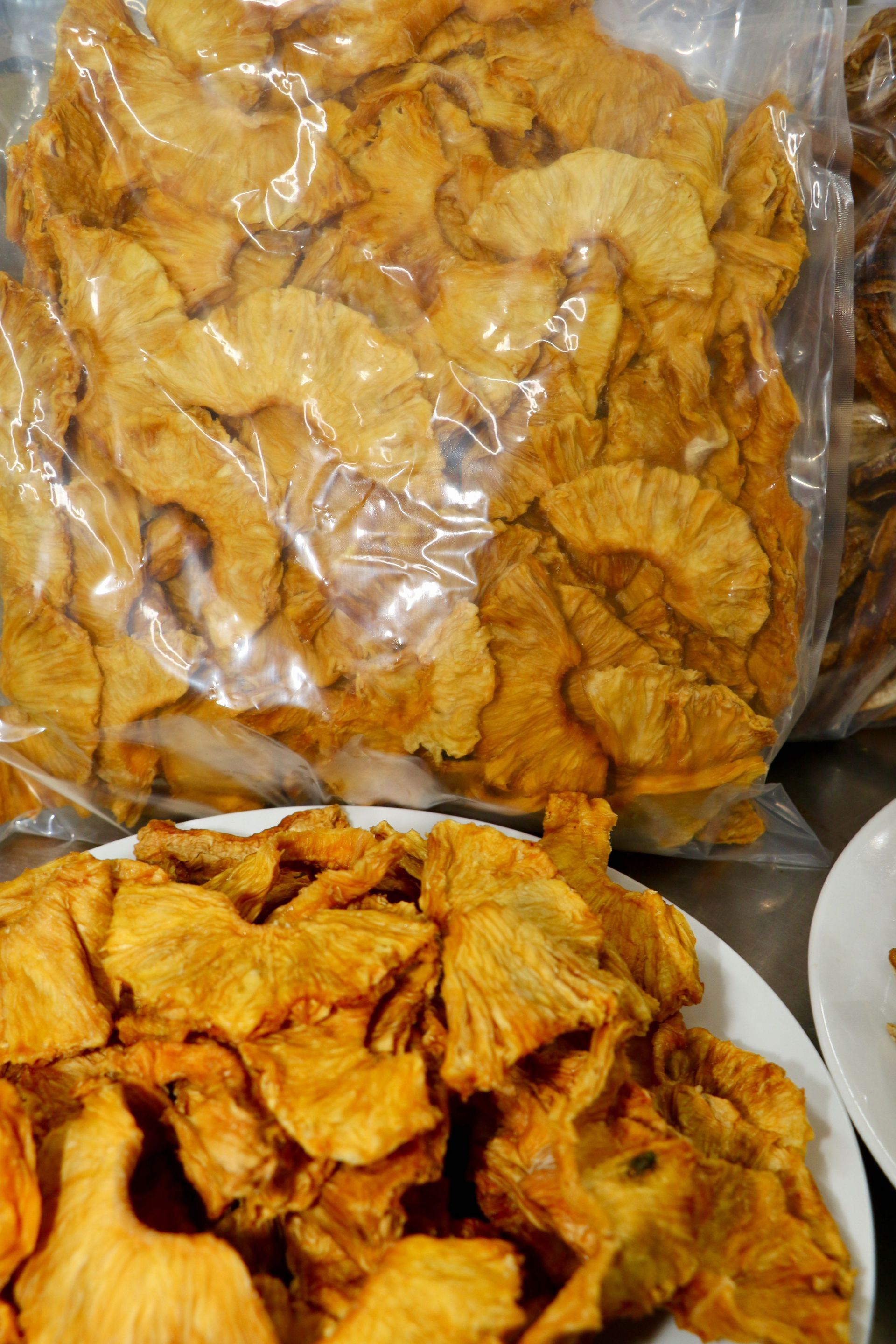 A Bunch of Red Cookies Are Sitting on a Shelf — Mareeba Golden Dried Mangoes in Mareeba, QLD