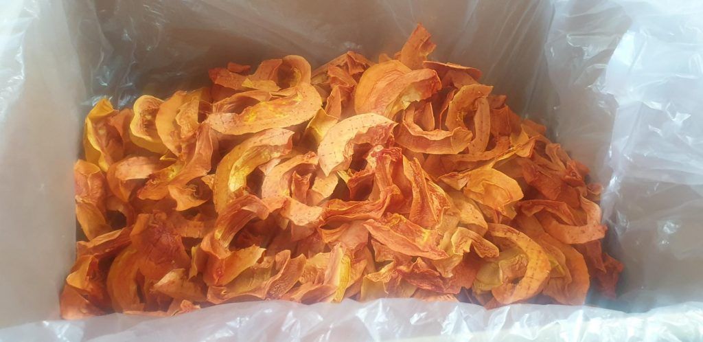 A Pile of Dried Fruit in a Plastic Bag in a Box — Mareeba Golden Dried Mangoes in Mareeba, QLD