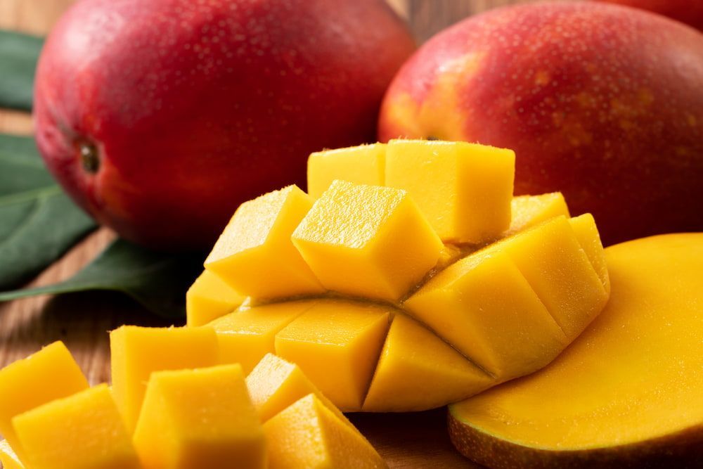 A Close Up of a Sliced Mango on a Wooden Table — Mareeba Golden Dried Mangoes in Brisbane, QLD