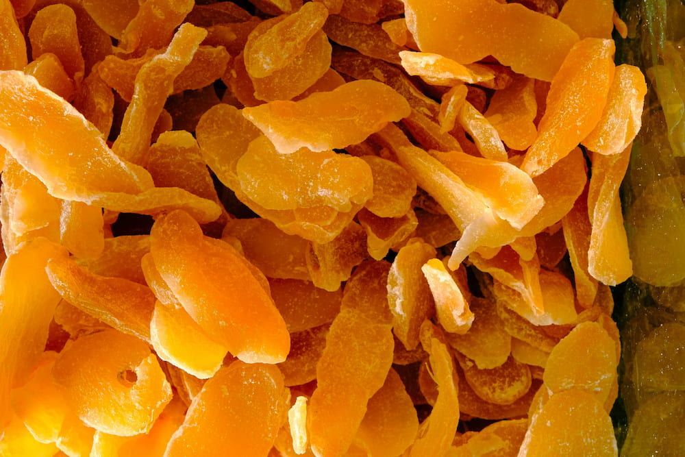 A Close Up of a Pile of Dried Orange Slices — Mareeba Golden Dried Mangoes in Gold Coast, QLD