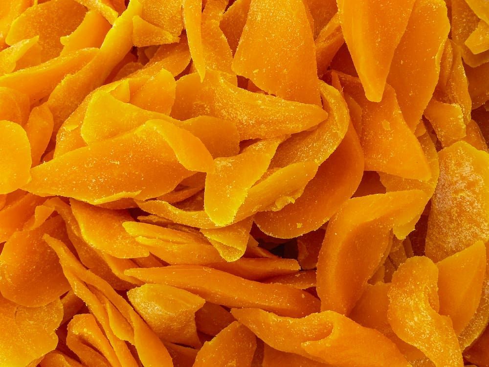A Close Up of a Pile of Dried Mango Slices — Mareeba Golden Dried Mangoes in Cairns, QLD