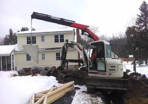 Residential Driveway Being Excavated — Paving Services in Nashua, NH