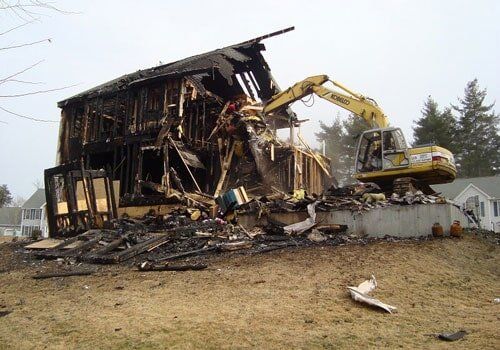 Burned House Being Demolished — Paving Services in Nashua, NH