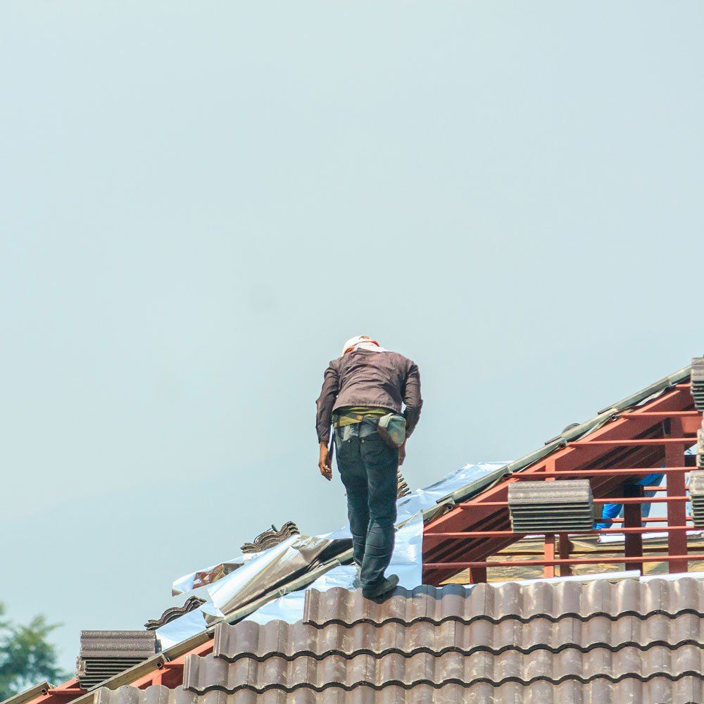 Man Working on The Roof — Glendora, CA — Advanced Roofing