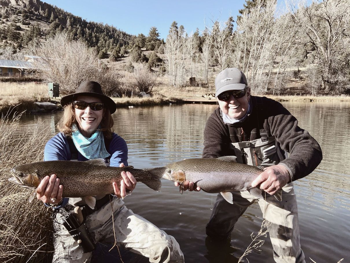 Happy Zia Fly angler couple out on the water with their large catch!