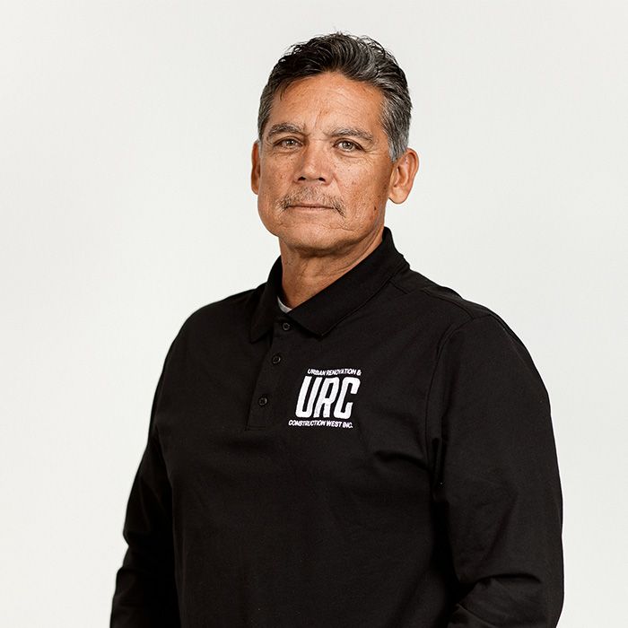 A man wearing a black shirt with the word urc on it