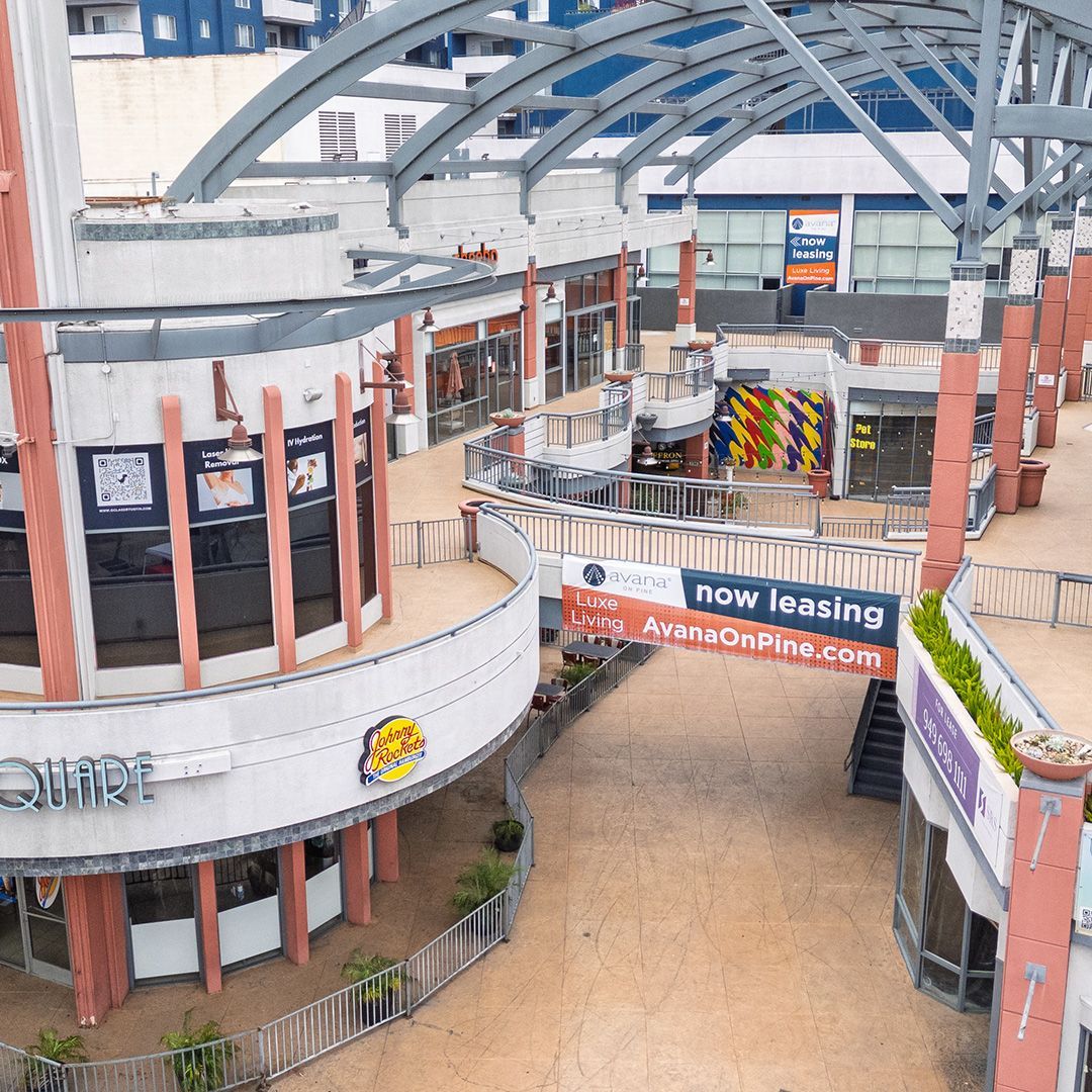 A room with a lot of junk in it and a window.