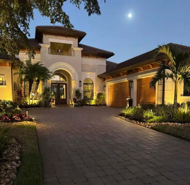 Accent landscape lighting installation in Fort Myers, FL enhancing outdoor aesthetics and ambiance.