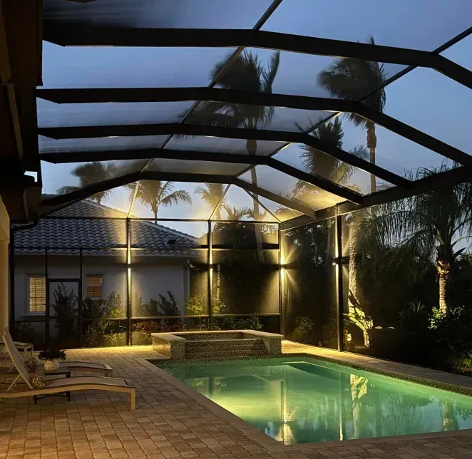 Professional outdoor accent lighting setup in Fort Myers, Florida for pathways and garden highlights.