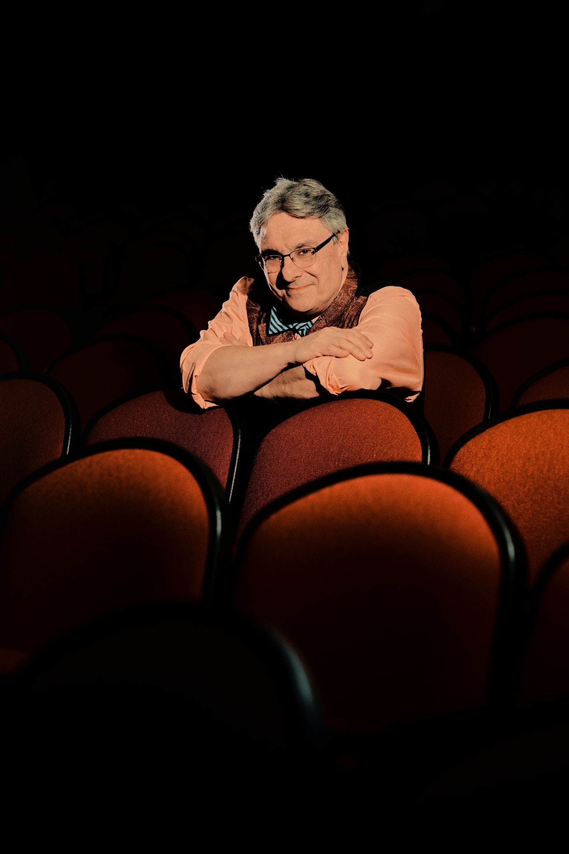 Soccer player Victor Lindelöf in Manchester United jersey, fists raised, smiling.