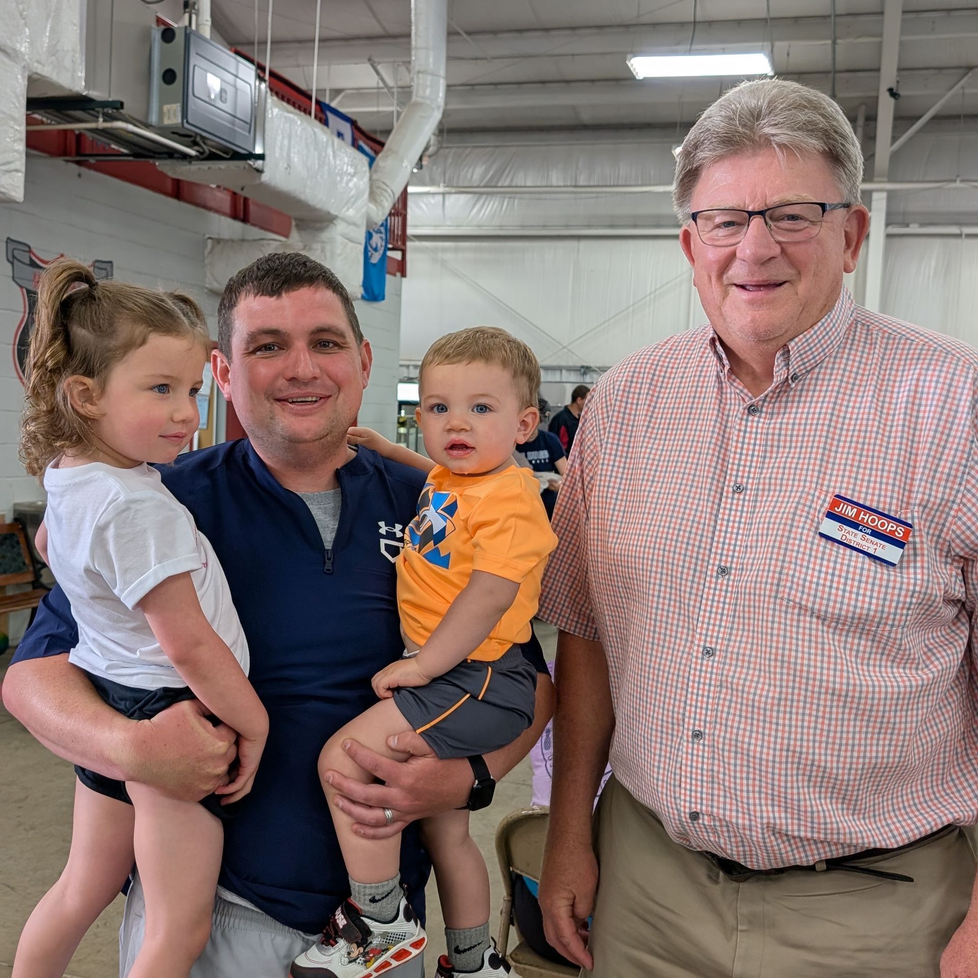 Jim Hoops with father and two children