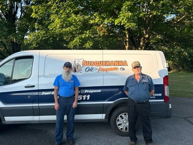 Two Men in Blue Uniforms | Dillsburg, PA | Susquehanna Oil and Propane
