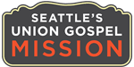 Logo for Seattle's Union Gospel Mission: a black, wavy-edged sign with white text and orange 