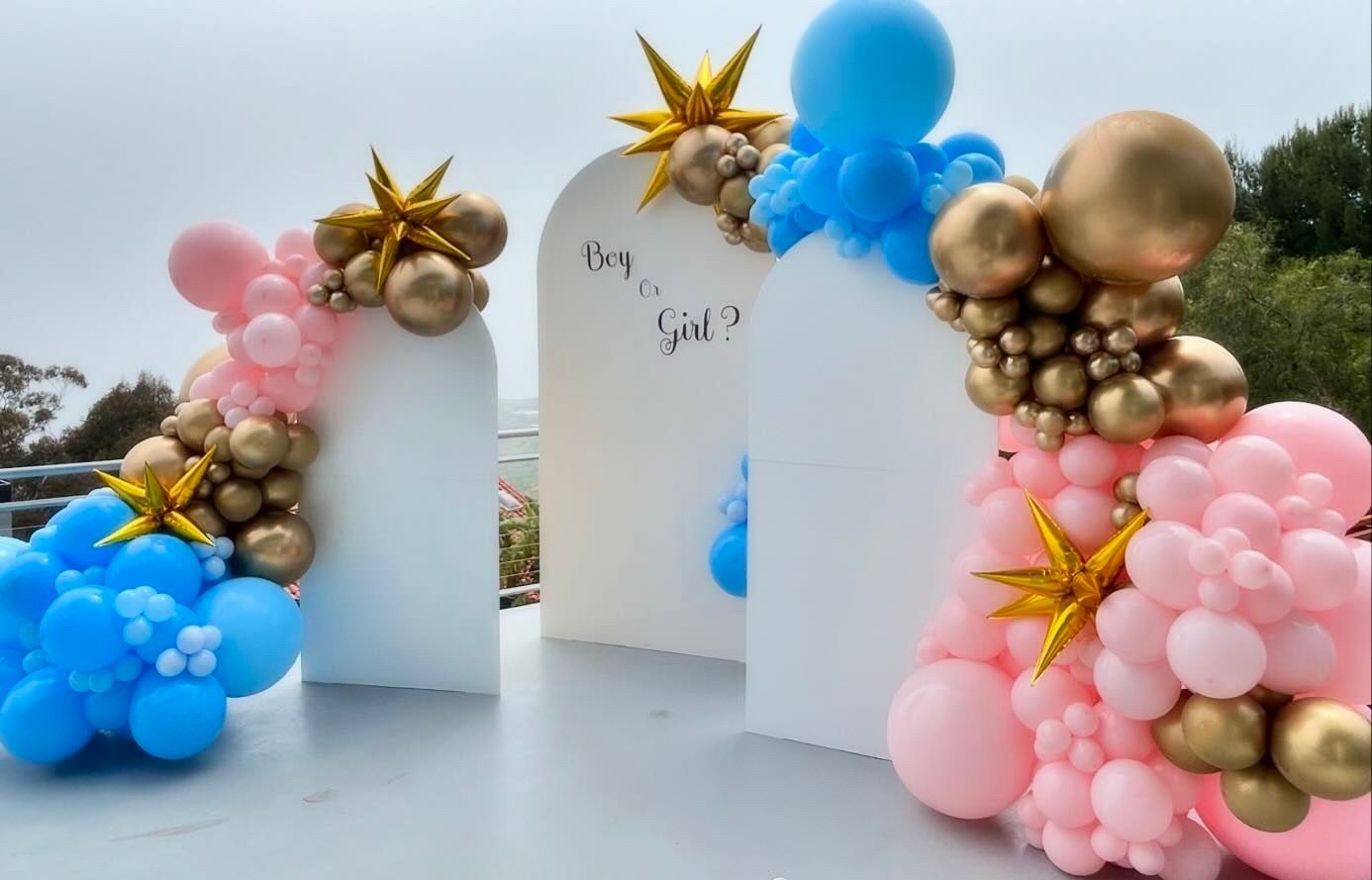 A bunch of balloons are sitting on top of a table.