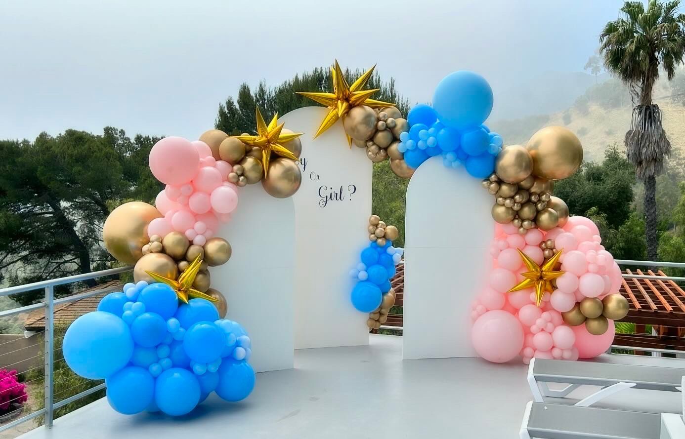 A bunch of balloons are sitting on top of a table.