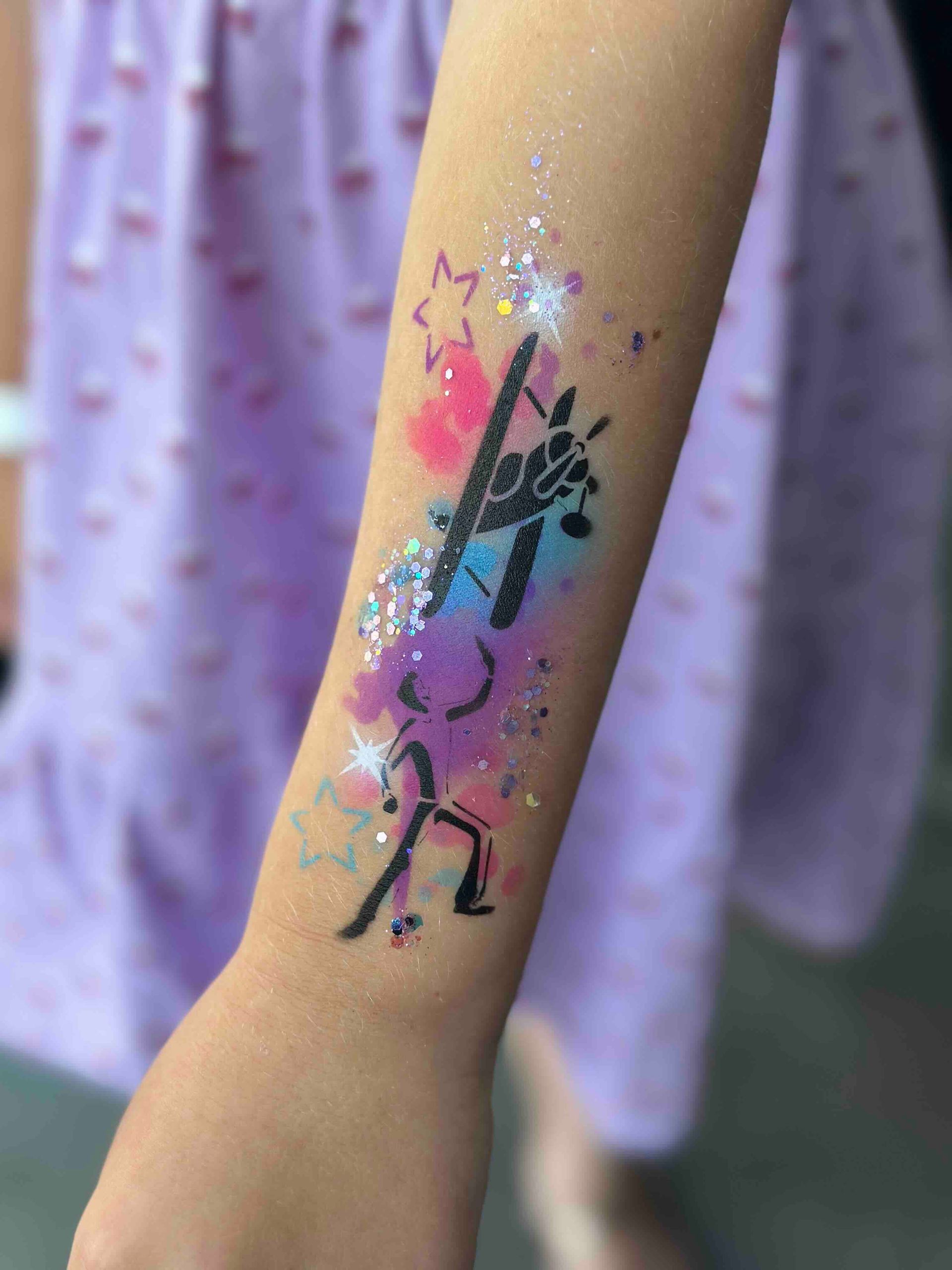A person with a tattoo on their arm.