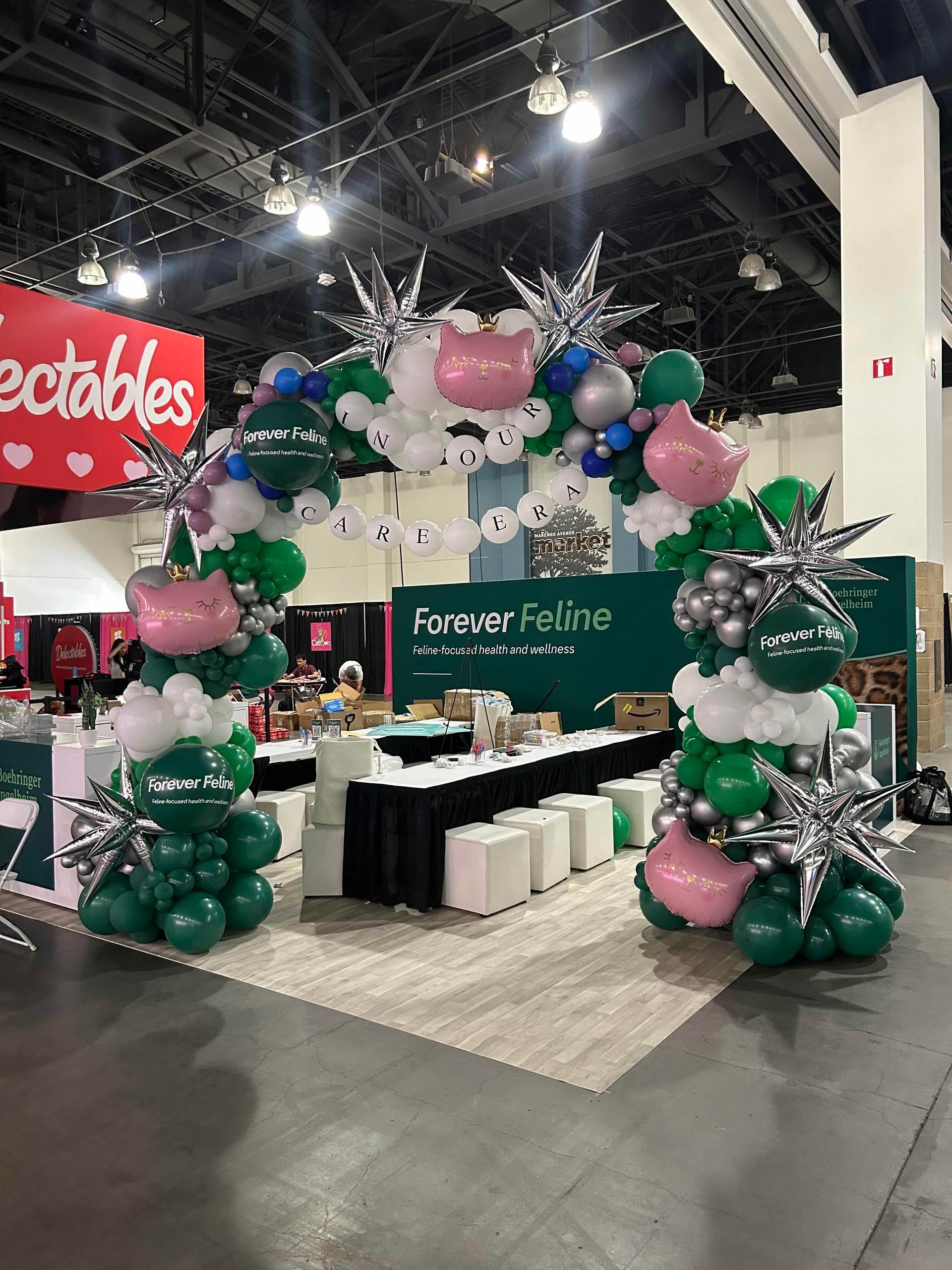 Incredible Custom Balloon arch inspired by Taylor Swift for Cat Con in Pasadena by The Balloon Guy