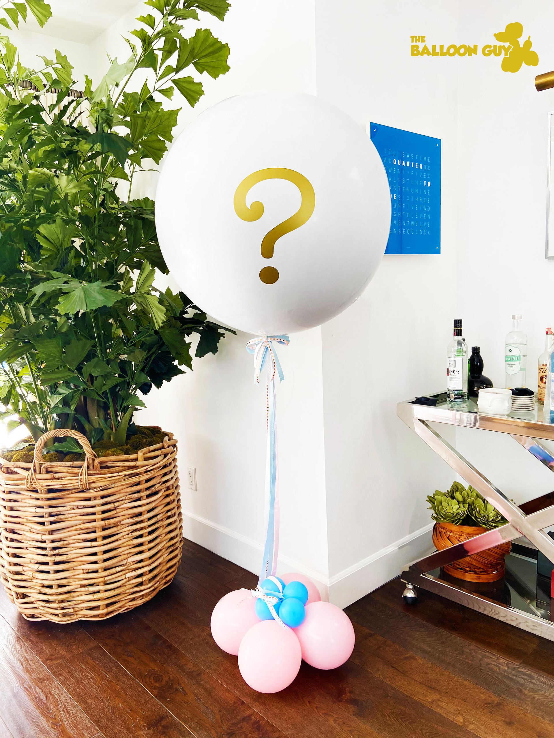 A white balloon with a question mark on it